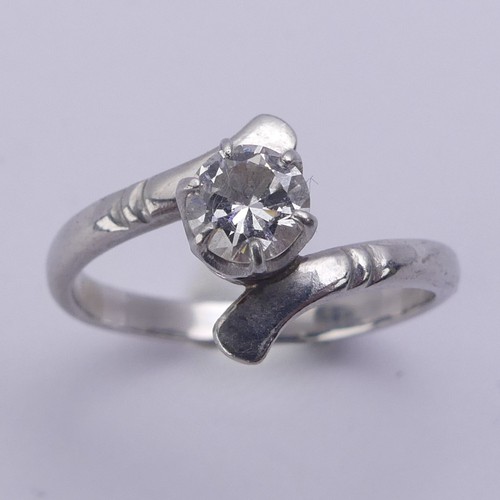 172 - A single stone diamond Ring, the split front with a claw set brilliant cut stone approx. 0.45ct, unm... 