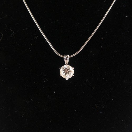 247 - A single stone diamond Pendant, the brilliant cut stone approx. 0.7ct, six claw set in 18ct white go... 