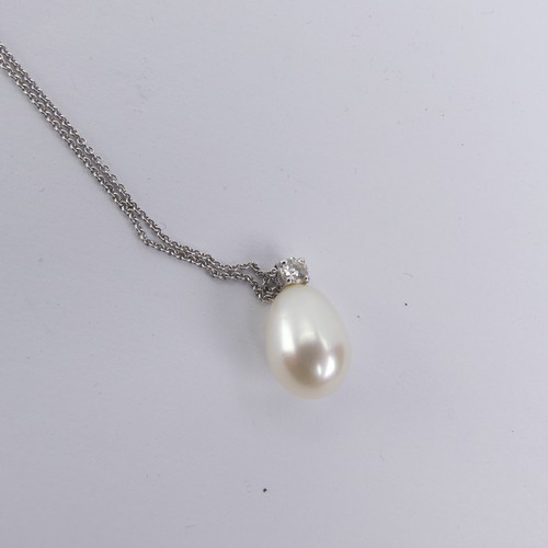 248 - A cultured pearl and diamond Pendant, the pear shaped pearl 14mm long, surmounted by a brilliant cut... 