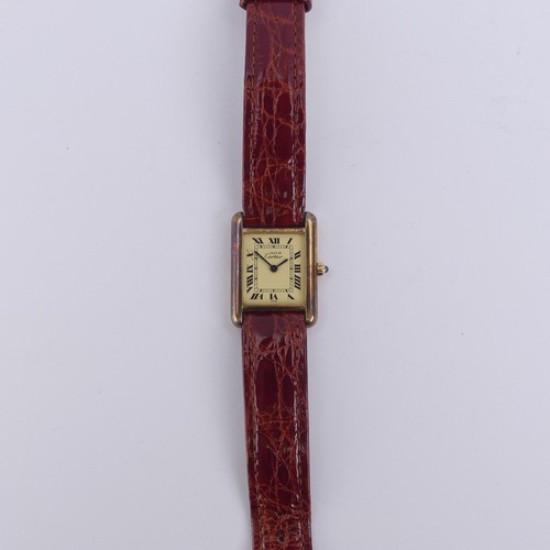 148 - A Must de Cartier silver gilt quartz Vermeil Tank Wristwatch, model no: 3 66001, case no. 85276, 20m... 