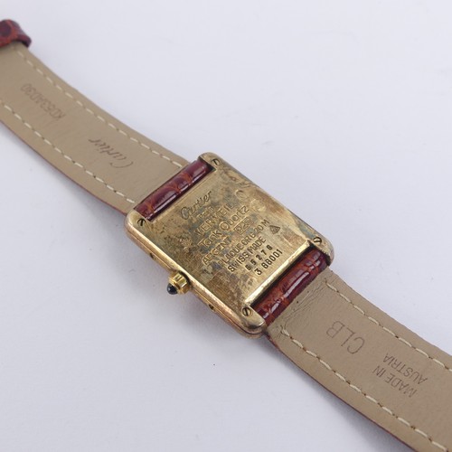 148 - A Must de Cartier silver gilt quartz Vermeil Tank Wristwatch, model no: 3 66001, case no. 85276, 20m... 