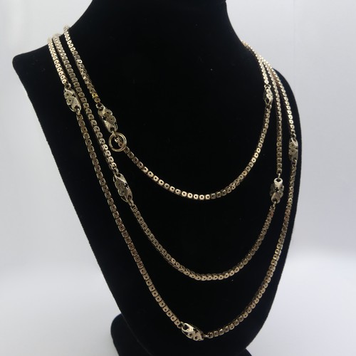 250 - A 9ct yellow gold fancy box link double Chain, with watch clip fitting, shortest length 74cm, 25.7g.... 