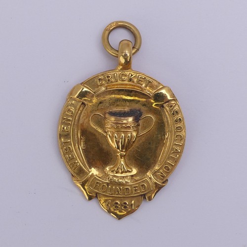 302 - A 9ct yellow gold Prize Fob, from the 'West End Cricket Association', with presentation inscription ... 