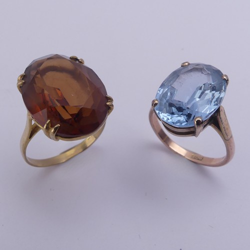 175 - A facetted oval citrine Dress Ring, the stone approx. 19.8mm x 14.9mm, four claw set in 9ct gold, Si... 