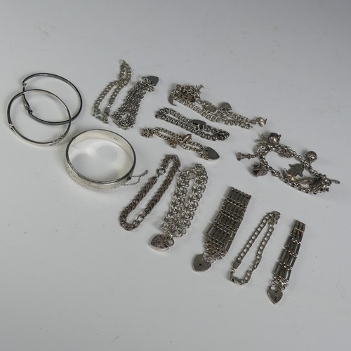 309 - Two silver Charm Bracelets, together with a silver hinged bangle and eleven other various silver bra... 