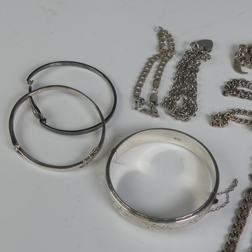 309 - Two silver Charm Bracelets, together with a silver hinged bangle and eleven other various silver bra... 