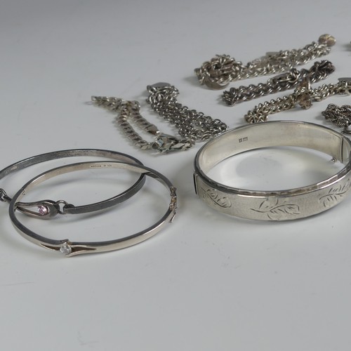 309 - Two silver Charm Bracelets, together with a silver hinged bangle and eleven other various silver bra... 