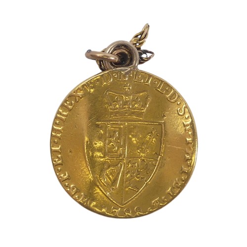 340 - A George III gold Guinea, dated 1788, with 'Spade' reverse, with soldered pendant mount, wavy.... 