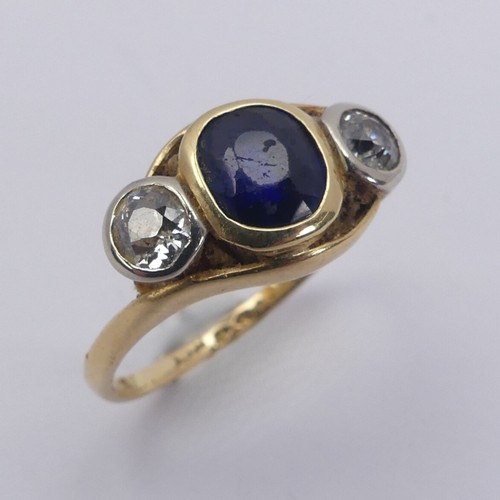 177 - A sapphire and diamond three stone Ring, the cushion shaped facetted central sapphire approx. 5.75mm... 