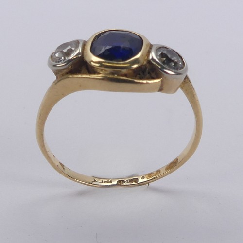 177 - A sapphire and diamond three stone Ring, the cushion shaped facetted central sapphire approx. 5.75mm... 