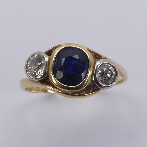 177 - A sapphire and diamond three stone Ring, the cushion shaped facetted central sapphire approx. 5.75mm... 