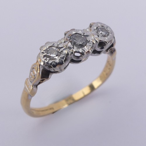 183 - A small three stone diamond Ring, illusion set in 18ct yellow gold and platinum, Size N, 2.9g.... 