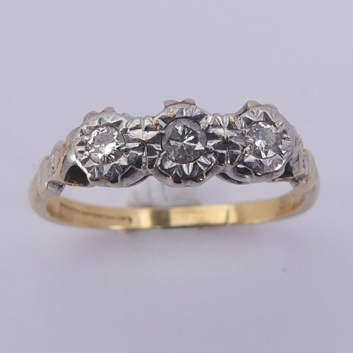 183 - A small three stone diamond Ring, illusion set in 18ct yellow gold and platinum, Size N, 2.9g.... 