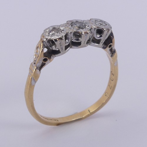 183 - A small three stone diamond Ring, illusion set in 18ct yellow gold and platinum, Size N, 2.9g.... 