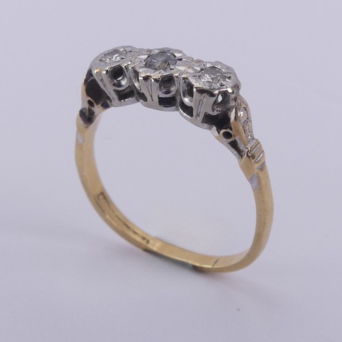 183 - A small three stone diamond Ring, illusion set in 18ct yellow gold and platinum, Size N, 2.9g.... 