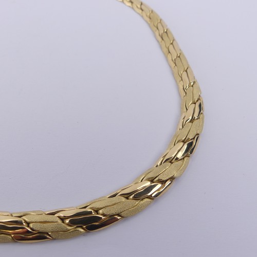 252 - A graduated 18ct yellow gold Necklace, formed of stylised textured and polished bricklinks, with int... 