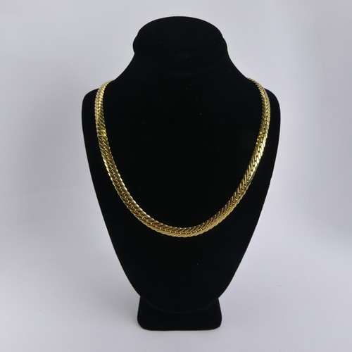 253 - An 18ct yellow gold curblink Necklace, with French control marks, 41cm long, 5.7mm wide, 15.6g.... 