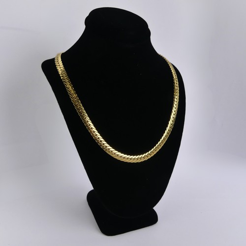 253 - An 18ct yellow gold curblink Necklace, with French control marks, 41cm long, 5.7mm wide, 15.6g.... 