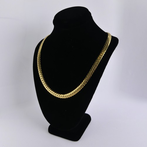 253 - An 18ct yellow gold curblink Necklace, with French control marks, 41cm long, 5.7mm wide, 15.6g.... 