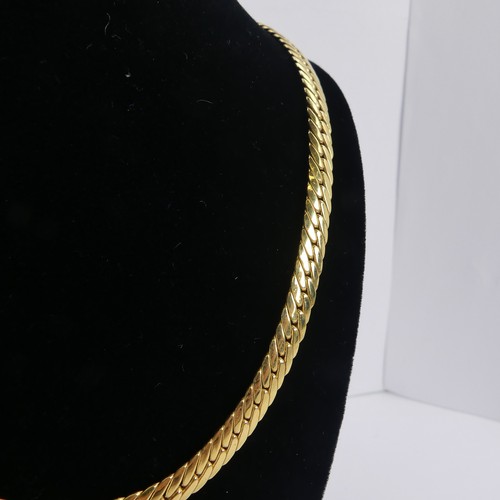 253 - An 18ct yellow gold curblink Necklace, with French control marks, 41cm long, 5.7mm wide, 15.6g.... 