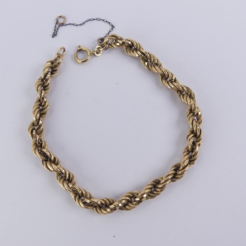 271 - An 18ct yellow gold fancy link Bracelet, one link damaged, 21cm long, 10.2g.... 