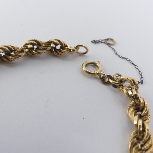 271 - An 18ct yellow gold fancy link Bracelet, one link damaged, 21cm long, 10.2g.... 