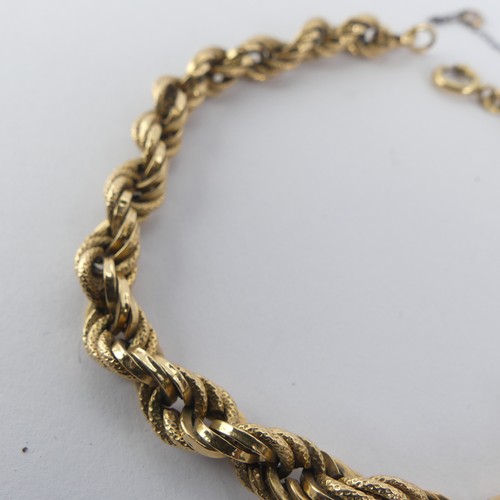 271 - An 18ct yellow gold fancy link Bracelet, one link damaged, 21cm long, 10.2g.... 