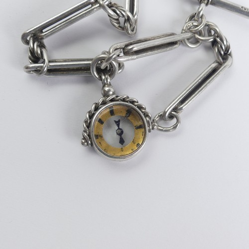 150 - A pretty Continental silver Fob Watch, the white enamel dial with Roman Numerals, silver and gilt fo... 