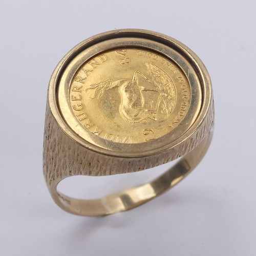 342 - A South African 1/10oz Krugerrand, dated 1984, in 9ct gold ring mount, Size V, 7.8g.... 