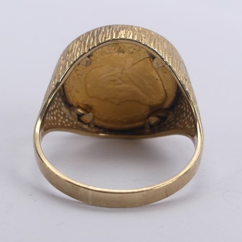 342 - A South African 1/10oz Krugerrand, dated 1984, in 9ct gold ring mount, Size V, 7.8g.... 