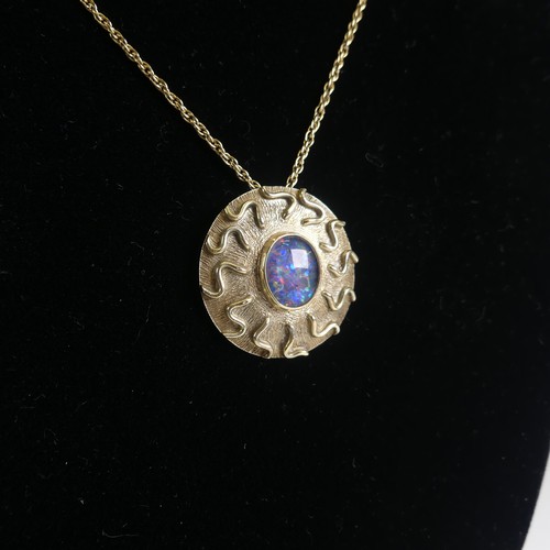 255 - A 9ct white gold circular Pendant, the centre set opaline, 2.9cm diameter, hallmarked London 1991, o... 