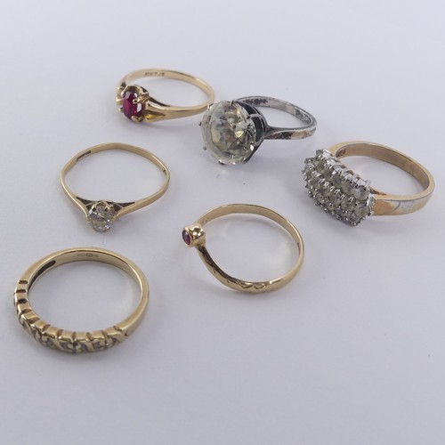 191 - Four 9ct yellow gold Rings, one with V shaped front set ruby, Size O, one small diamond points, Size... 