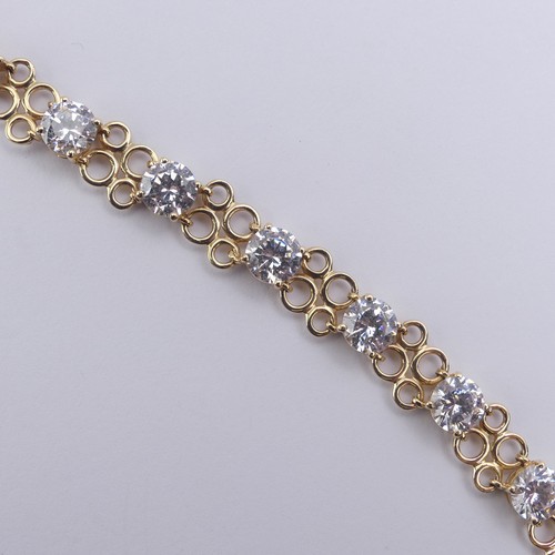 272 - A cubic zirconia Bracelet, the thirteen brilliant cut stones approx. 6mm diameter, claw set in 14ct ... 