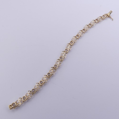 272 - A cubic zirconia Bracelet, the thirteen brilliant cut stones approx. 6mm diameter, claw set in 14ct ... 