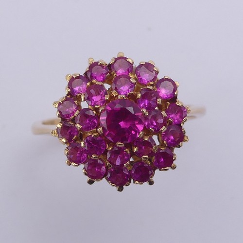 195 - A ruby cluster Ring, the circular synthetic pink stones claw set in unmarked yellow metal, tested as... 