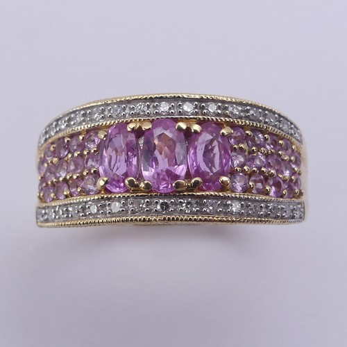 206 - A QVC 18ct yellow gold, pink sapphire and diamond Dress Ring, Size O, 6g.