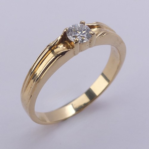 209 - A single stone diamond Ring, the brilliant cut stone approx. 0.24ct, four claw set in 18ct yellow go... 