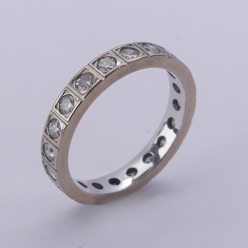 211 - A diamond full Eternity Ring, with twenty circular stones in squared mounts, total diamond weight ap... 