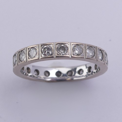 211 - A diamond full Eternity Ring, with twenty circular stones in squared mounts, total diamond weight ap... 