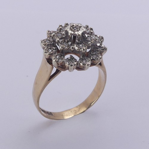 213 - A diamond cluster Ring, illusion set in 9ct yellow and white gold, Size N½, 4.1g.... 