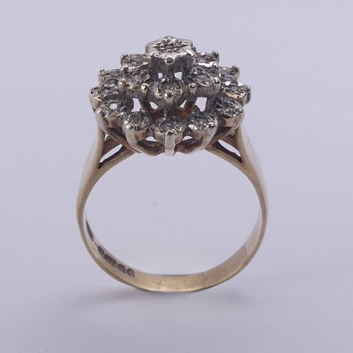 213 - A diamond cluster Ring, illusion set in 9ct yellow and white gold, Size N½, 4.1g.... 