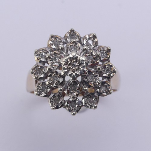 213 - A diamond cluster Ring, illusion set in 9ct yellow and white gold, Size N½, 4.1g.... 