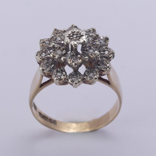 213 - A diamond cluster Ring, illusion set in 9ct yellow and white gold, Size N½, 4.1g.... 