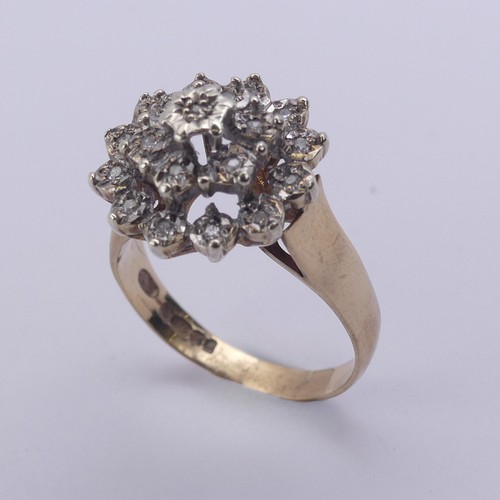 213 - A diamond cluster Ring, illusion set in 9ct yellow and white gold, Size N½, 4.1g.... 