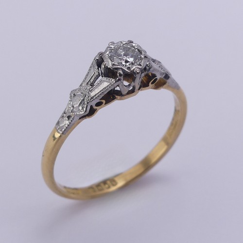 218 - A single stone diamond Ring, the circular cut stone approx. 0.15ct, illusion set in 18ct yellow gold... 