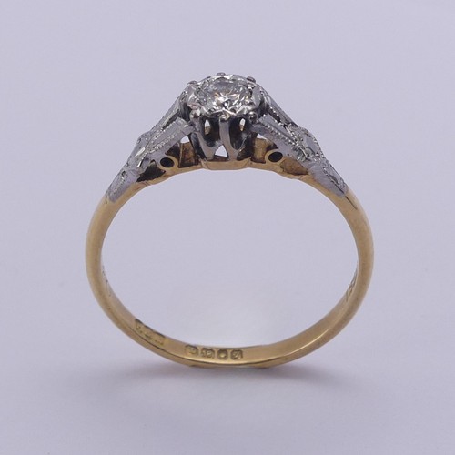 218 - A single stone diamond Ring, the circular cut stone approx. 0.15ct, illusion set in 18ct yellow gold... 