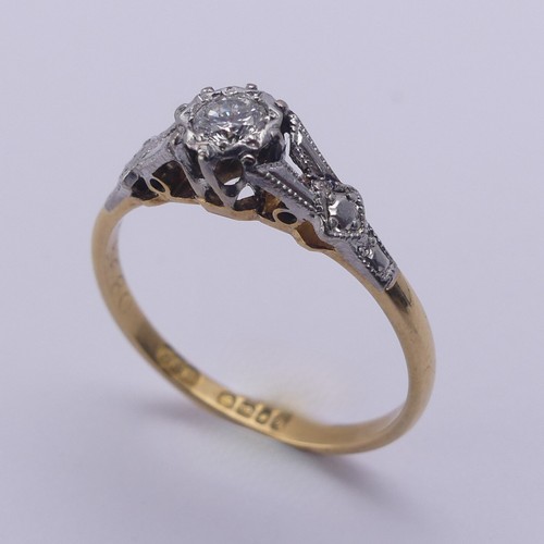 218 - A single stone diamond Ring, the circular cut stone approx. 0.15ct, illusion set in 18ct yellow gold... 