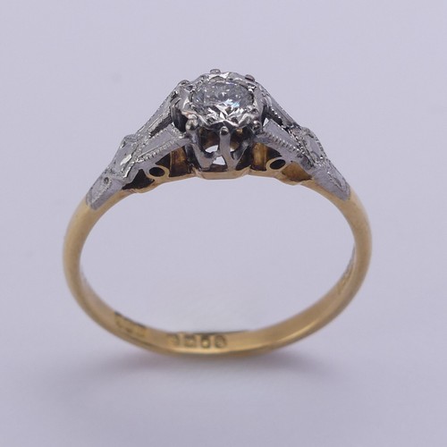 218 - A single stone diamond Ring, the circular cut stone approx. 0.15ct, illusion set in 18ct yellow gold... 