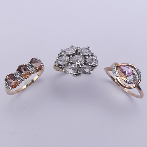 222 - Three 9ct gold gem set Rings, one with pear shaped white stones, Size N, the other two 'TV Channel' ... 