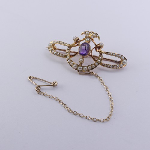 280 - An Edwardian amethyst and seed pearl Brooch, all mounted in 15ct yellow gold, 4.2cm long, 5.5g, in a... 